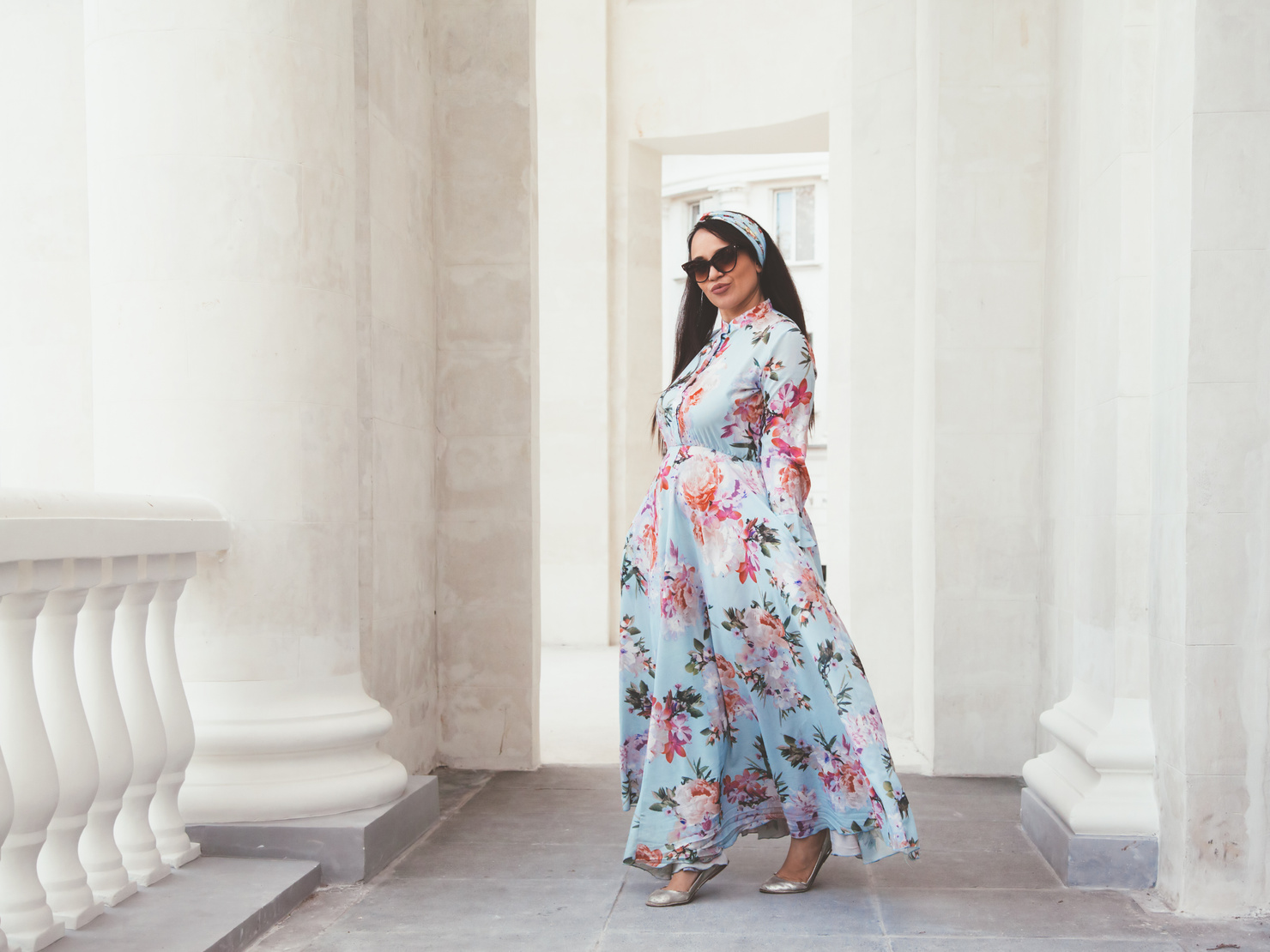 Woman Wearing a Long Floral Dress 